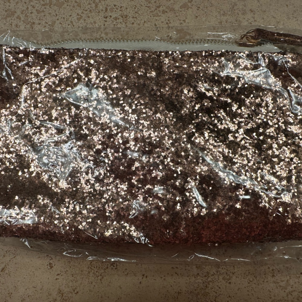 Rose gold sequin make up bag from Farmasi